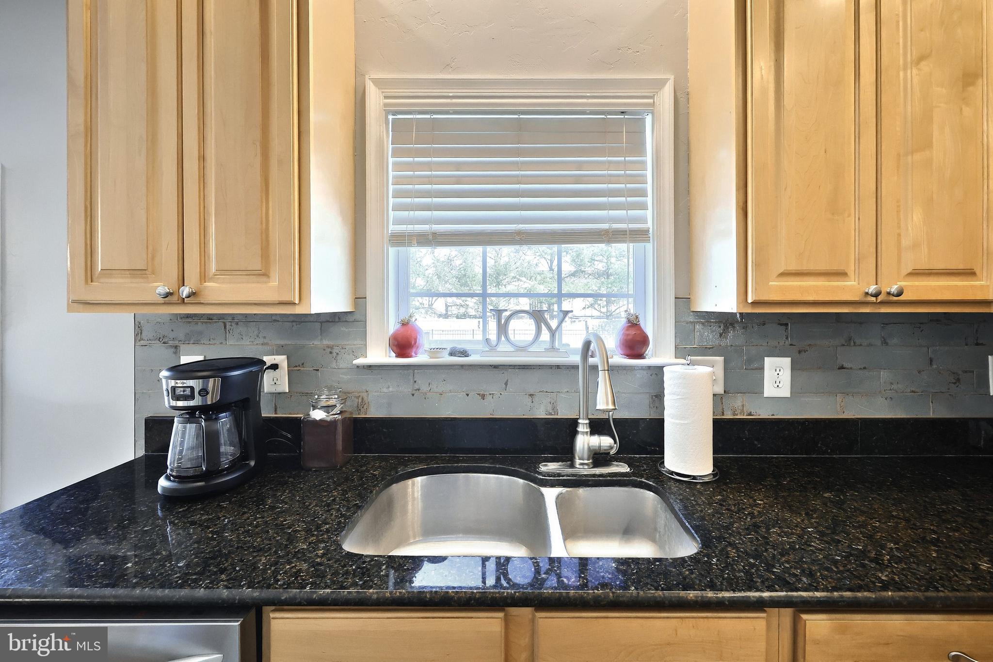 1 Hickory Lane Littlestown, PA 17340 - Photo 5 of 49 a kitchen with sink a window and cabinets
