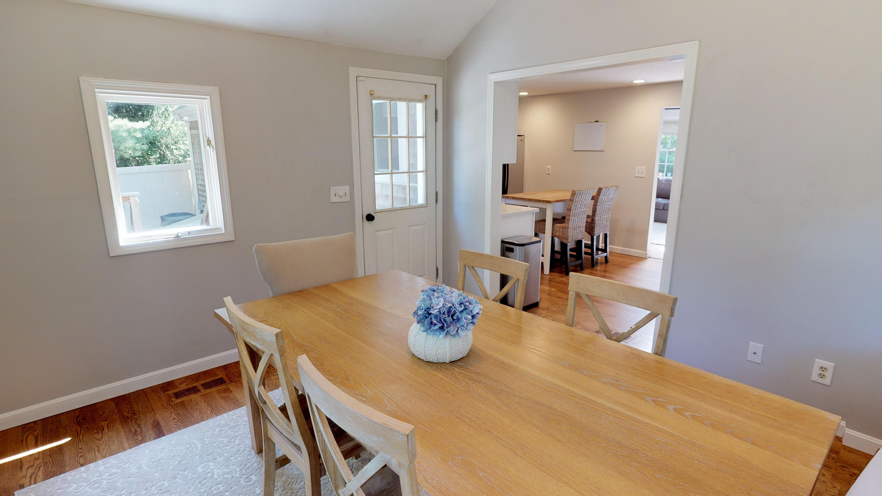 185 Sandy Valley Road Marstons Mills, MA 02648 - Photo 24 of 35 a view of a dining room with furniture and wooden floor