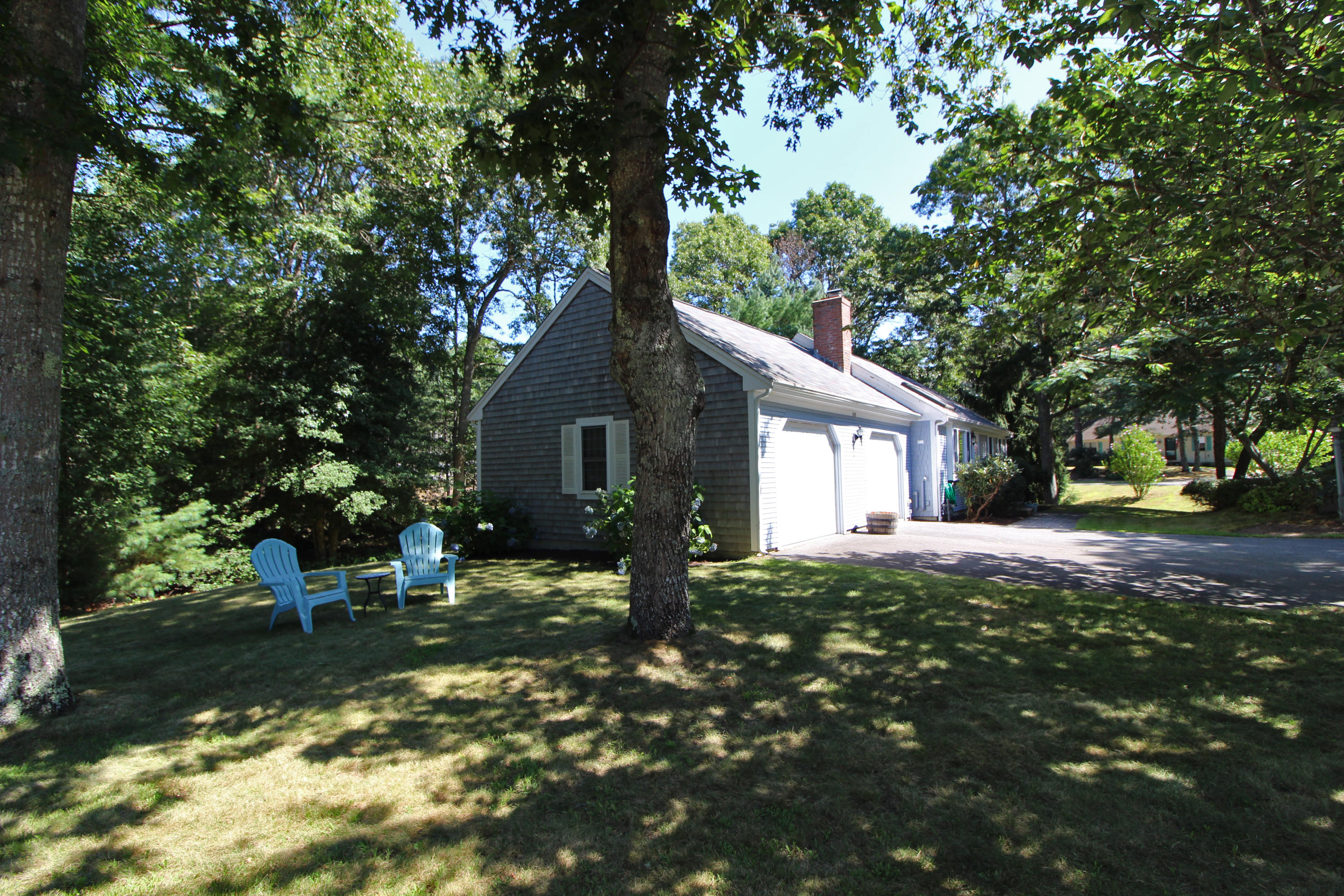 185 Sandy Valley Road Marstons Mills, MA 02648 - Photo 3 of 35 a view of a house with backyard and trees