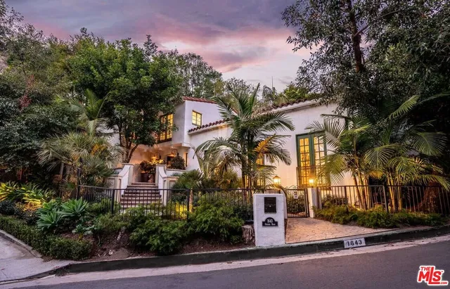 front view of a house with a street