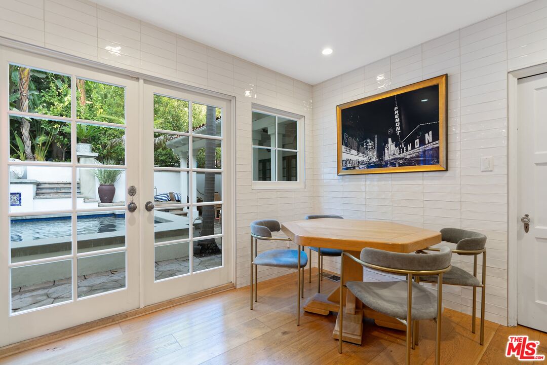 1643 Queens Road Los Angeles, CA 90069 - Photo 16 of 44 a workspace with wooden floor and a window