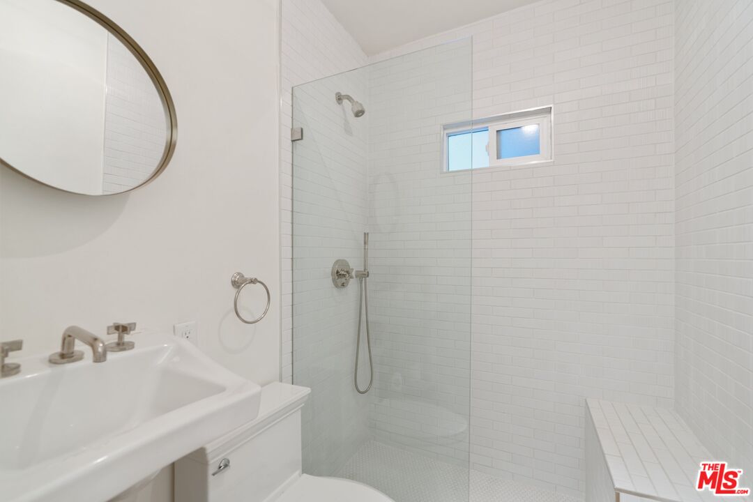 1643 Queens Road Los Angeles, CA 90069 - Photo 20 of 44 a bathroom with a sink a toilet and shower