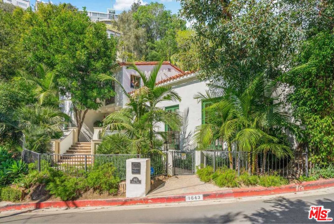 1643 Queens Road Los Angeles, CA 90069 - Photo 2 of 44 an aerial view of a house with a yard and potted plants