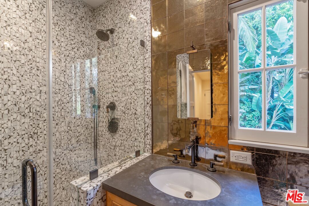 1643 Queens Road Los Angeles, CA 90069 - Photo 32 of 44 a bathroom with a sink a toilet and a shower