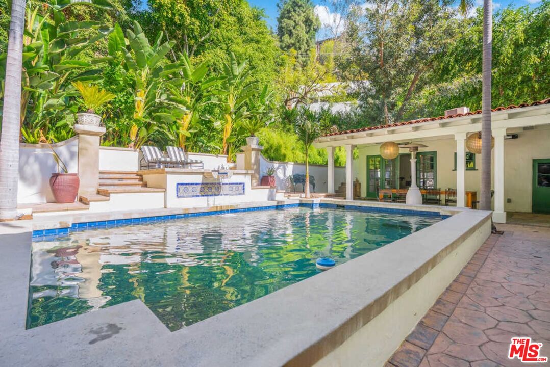 1643 Queens Road Los Angeles, CA 90069 - Photo 36 of 44 a view of a swimming pool with a patio