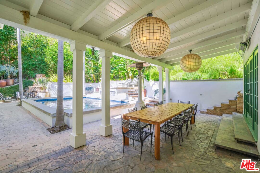 1643 Queens Road Los Angeles, CA 90069 - Photo 37 of 44 a view of a dining room with furniture window and outside view