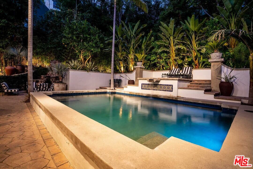 1643 Queens Road Los Angeles, CA 90069 - Photo 39 of 44 a view of a swimming pool with a patio