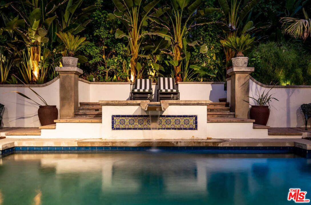 1643 Queens Road Los Angeles, CA 90069 - Photo 42 of 44 a view of a water with palm trees