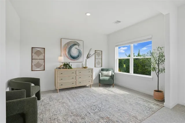 a room with furniture and a window