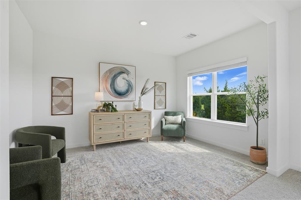 1614 Governors Boulevard Heath, TX 75126 - Photo 25 of 37 a room with furniture and a window