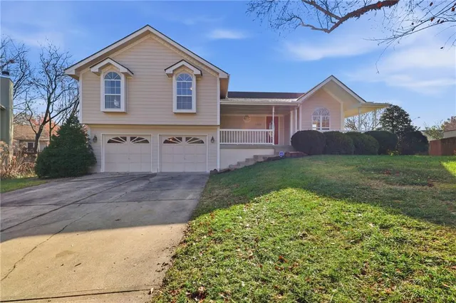 $360,000 | 1325 Northeast Foxwood Drive, Lee's Summit, MO 64086