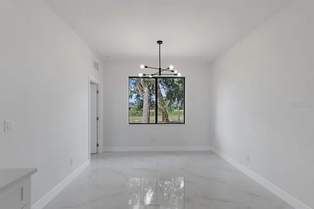 an entryway of a house with a window