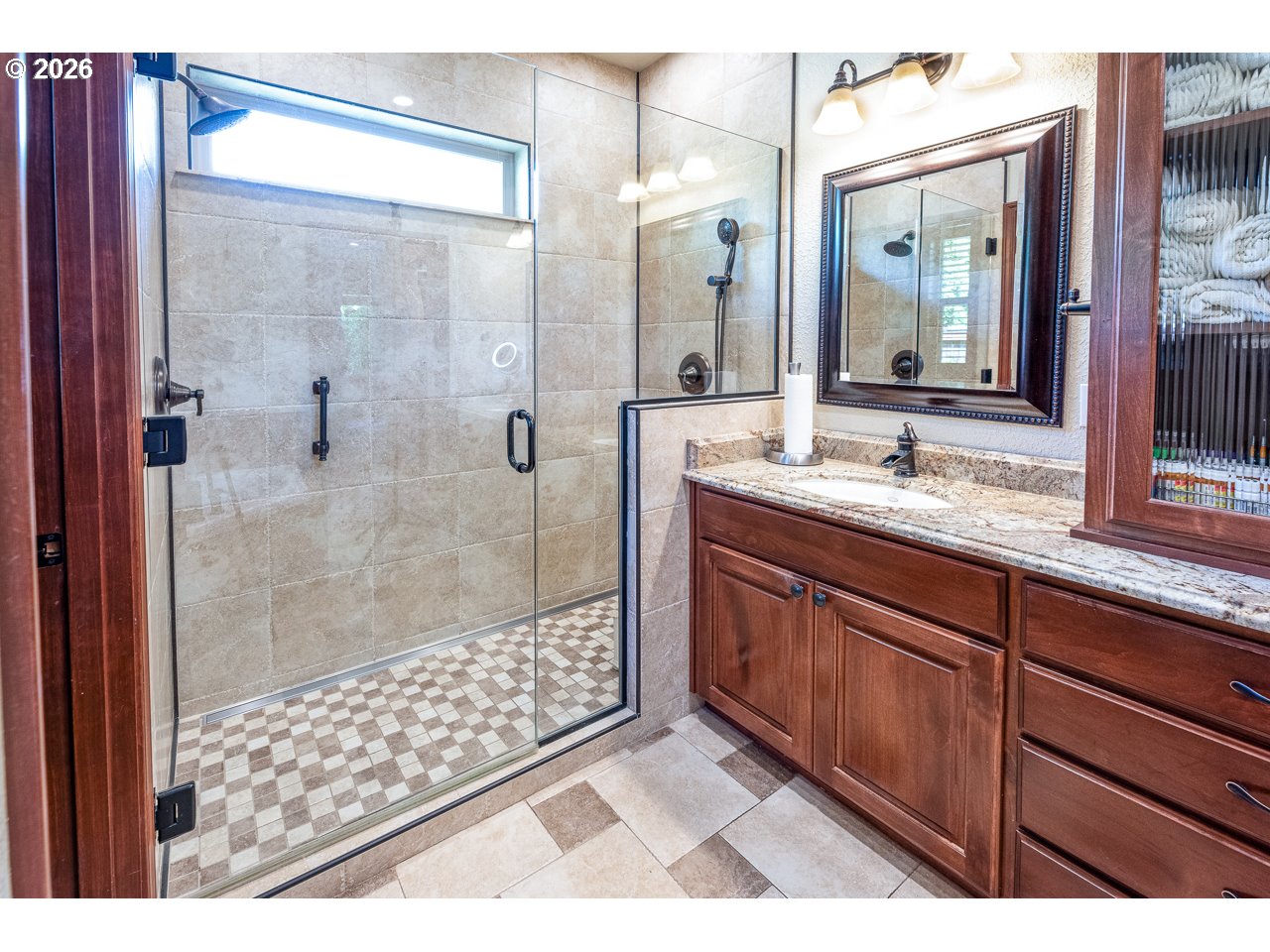 3381 Rosemont Way Eugene, OR 97401 - Photo 27 of 45 a bathroom with a granite countertop sink mirror and shower