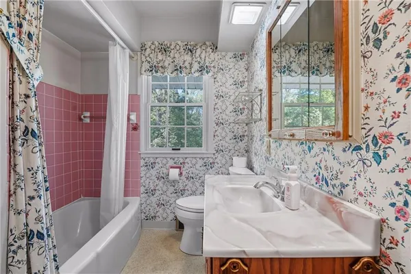a bathroom with a sink and a bathtub