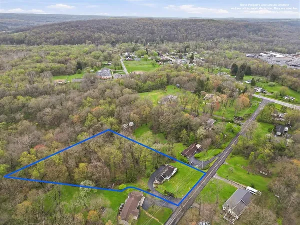 an aerial view of house with outdoor space