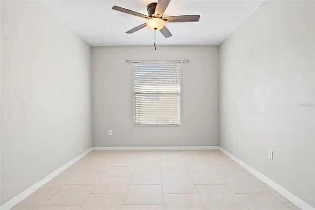 a view of a kitchen with a sink and cabinets