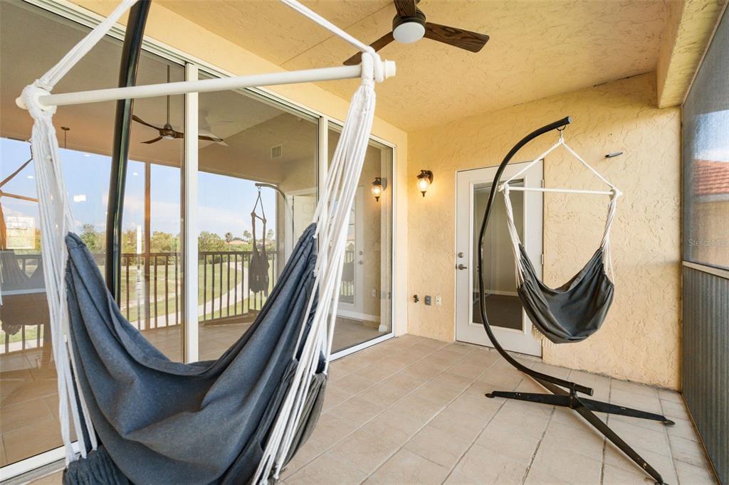 7187 Boca Grove Place, Unit 201 Lakewood Ranch, FL 34202 - Photo 30 of 48 a view of a floor to ceiling window