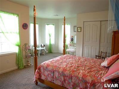 201 Gower Road Nazareth, PA 18064 - Photo 25 of 34 a bedroom with a bed and a large window