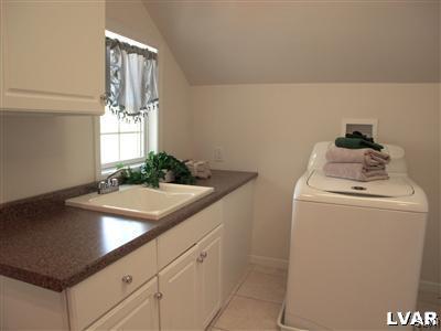 201 Gower Road Nazareth, PA 18064 - Photo 5 of 34 a room with a sink and a washer dryer