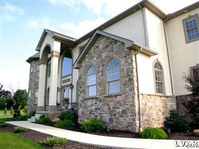 201 Gower Road Nazareth, PA 18064 - Photo 6 of 34 a front view of a house with a garden
