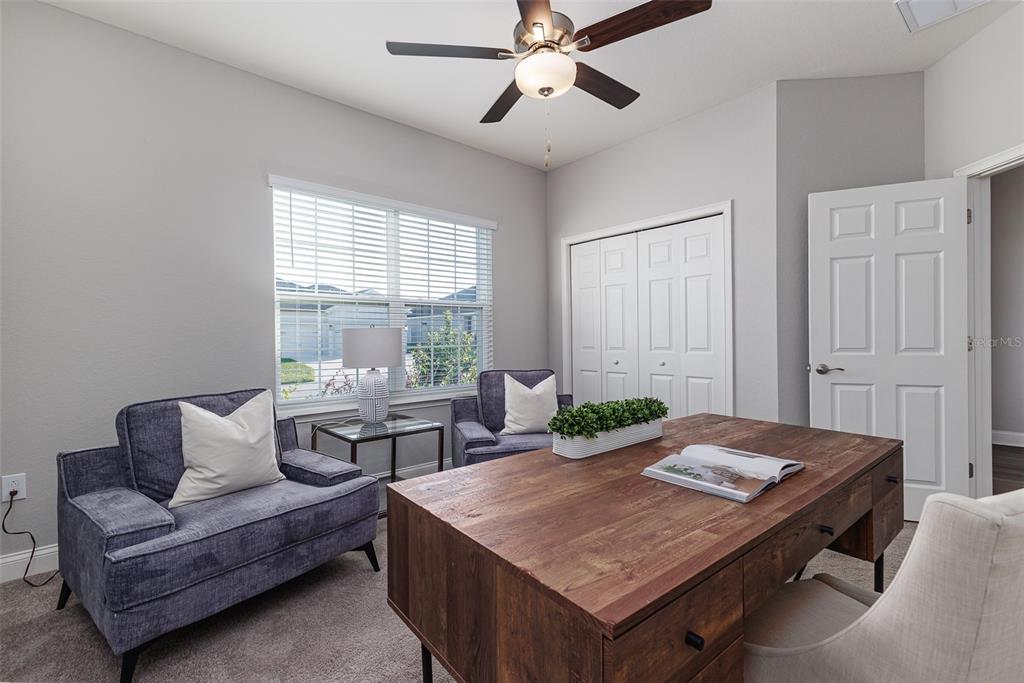 3150 Kendal Way Lakeland, FL 33813 - Photo 17 of 61 a living room with furniture and wooden floor