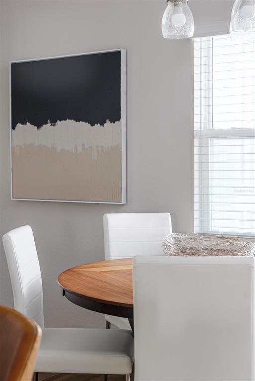 3150 Kendal Way Lakeland, FL 33813 - Photo 46 of 61 a room with a chair and a lamp with window