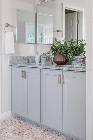 a view of a house with a yard and garage