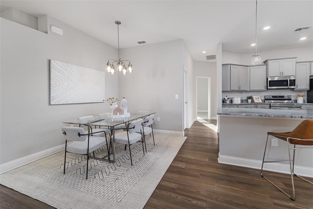3150 Kendal Way Lakeland, FL 33813 - Photo 10 of 61 a dining room with furniture and wooden floor