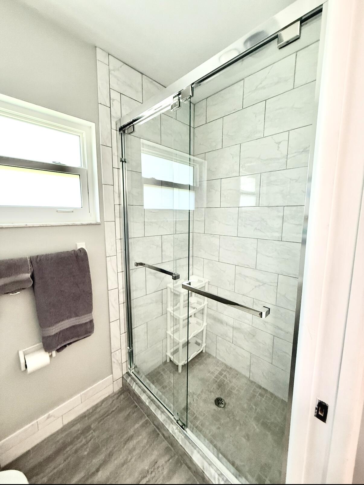 828 Timberview Drive, Unit D Fort Pierce, FL 34982 - Photo 15 of 28 a bathroom with a shower