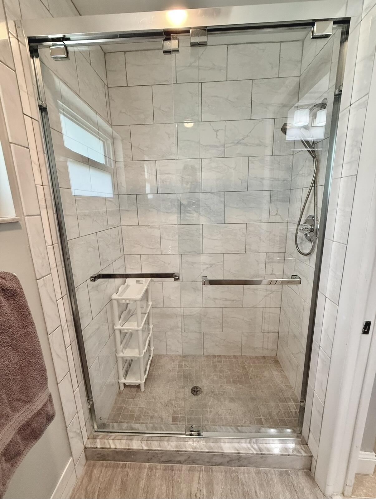 828 Timberview Drive, Unit D Fort Pierce, FL 34982 - Photo 16 of 28 a bathroom with a shower