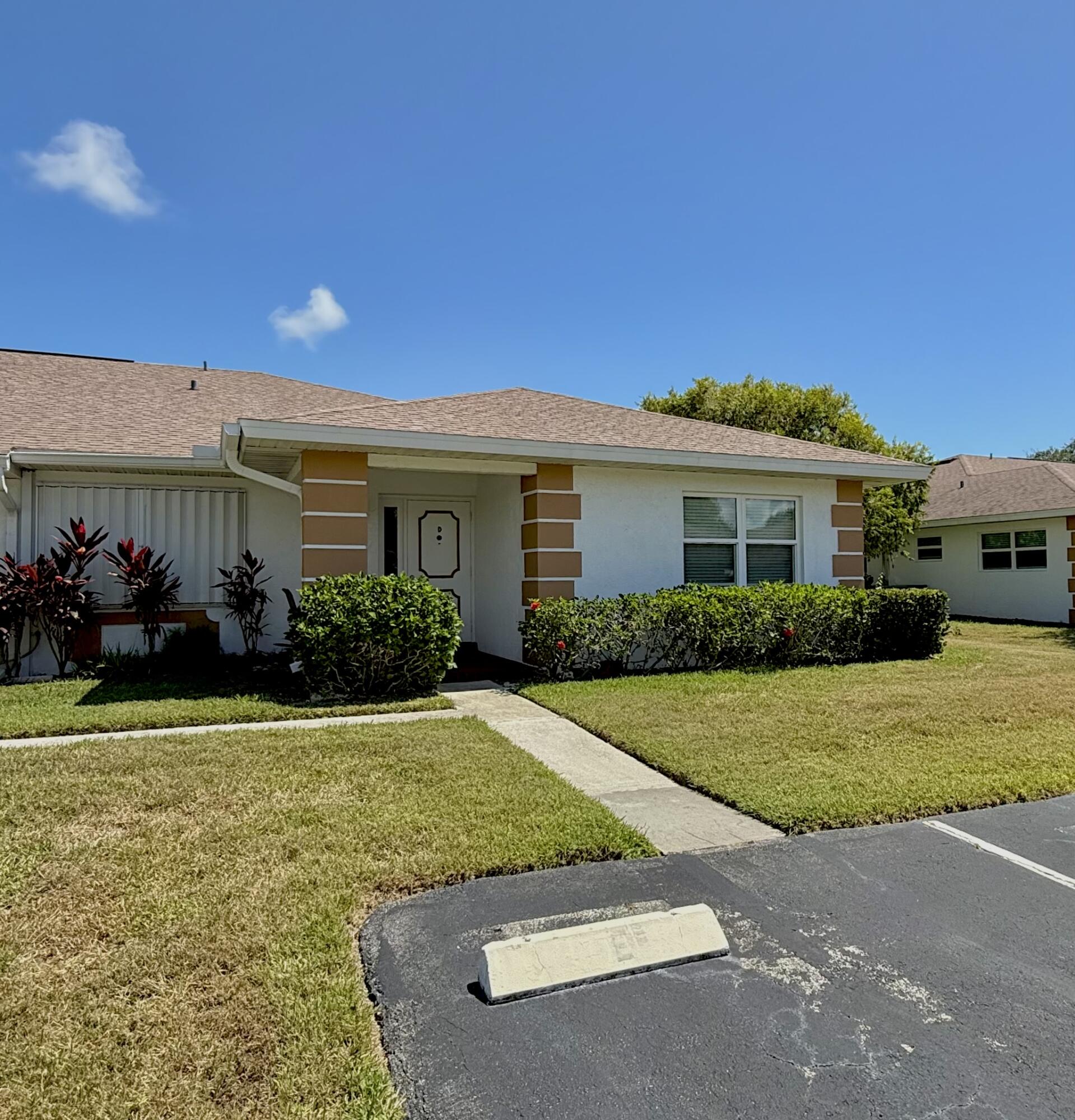 828 Timberview Drive, Unit D Fort Pierce, FL 34982 - Photo 2 of 28 a view of a house with a swimming pool