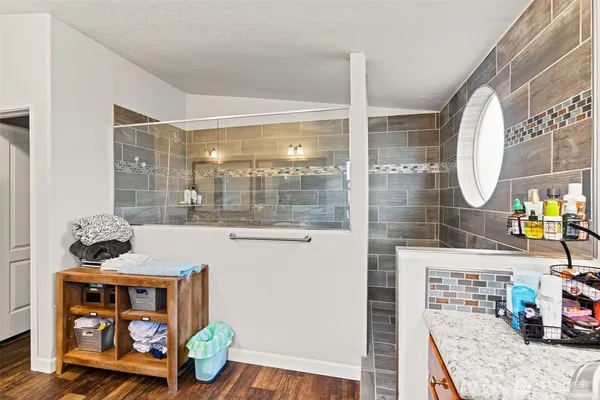 a room with furniture and a mirror