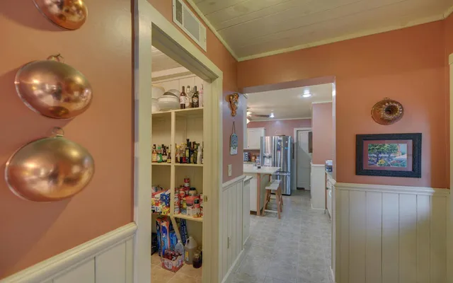 a view of a hallway with entryway