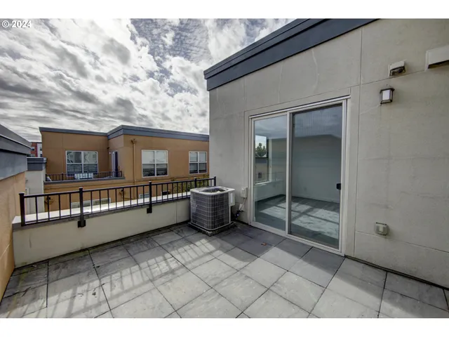 a view of a terrace with outdoor seating