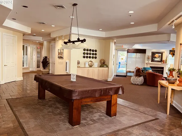 a room with gym equipment and mirrors