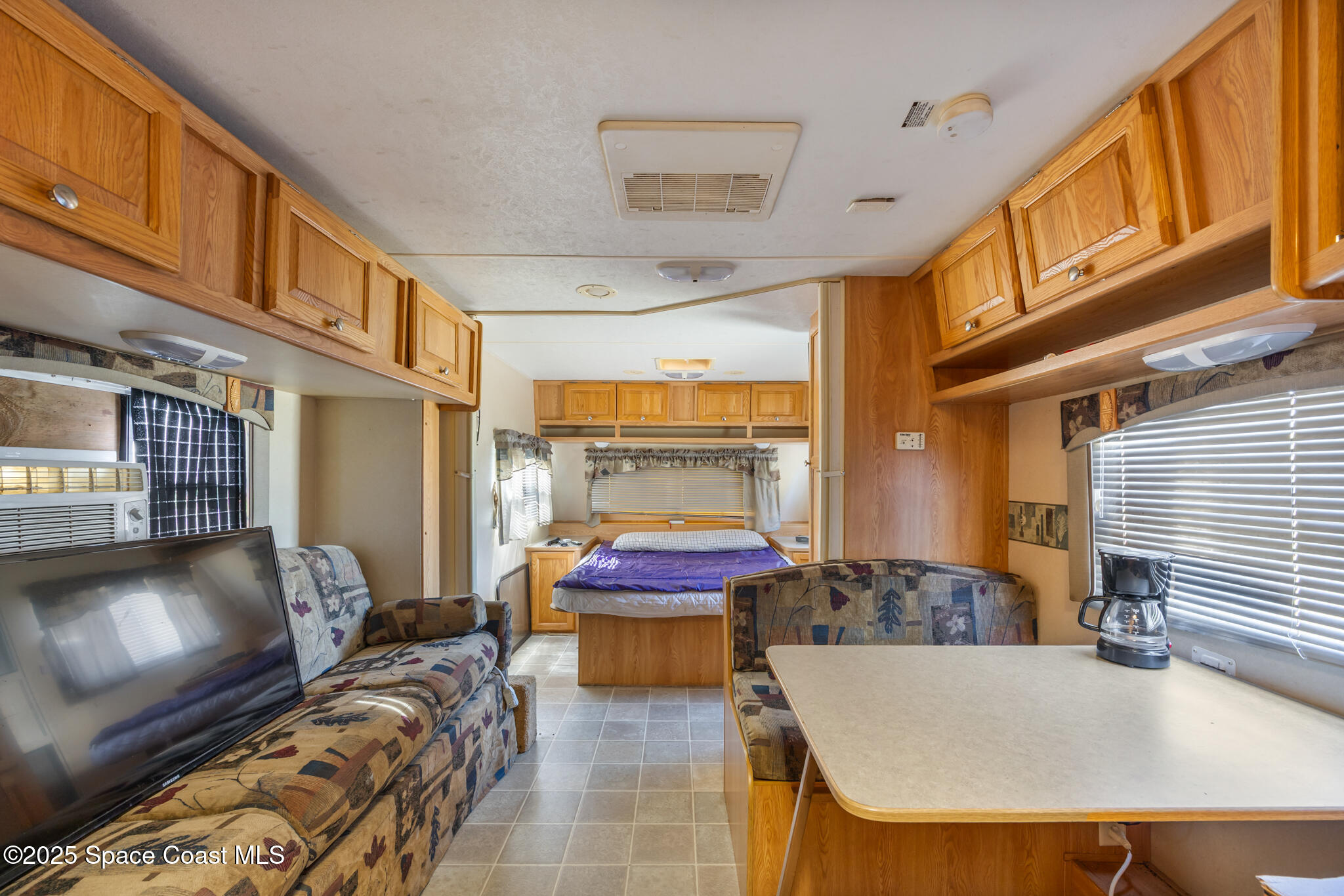 4895 Orange Street Mims, FL 32754 - Photo 22 of 33 a outdoor space with furniture and view of living room