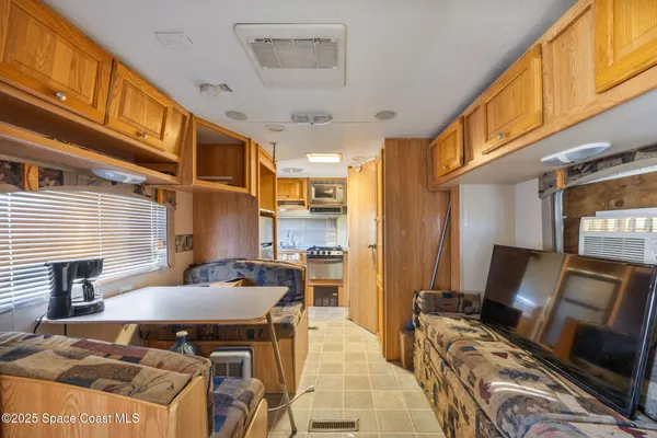 a view of a dining room with furniture
