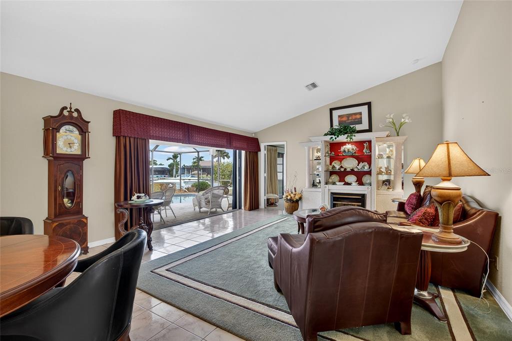 4075 Turtle Dove Circle Punta Gorda, FL 33950 - Photo 17 of 43 a living room with furniture and a flat screen tv