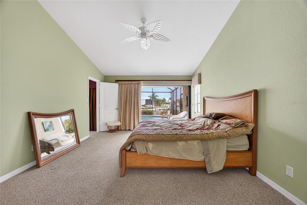 4075 Turtle Dove Circle Punta Gorda, FL 33950 - Photo 20 of 43 a bedroom with a bed and window