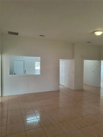 an empty room with a natural light