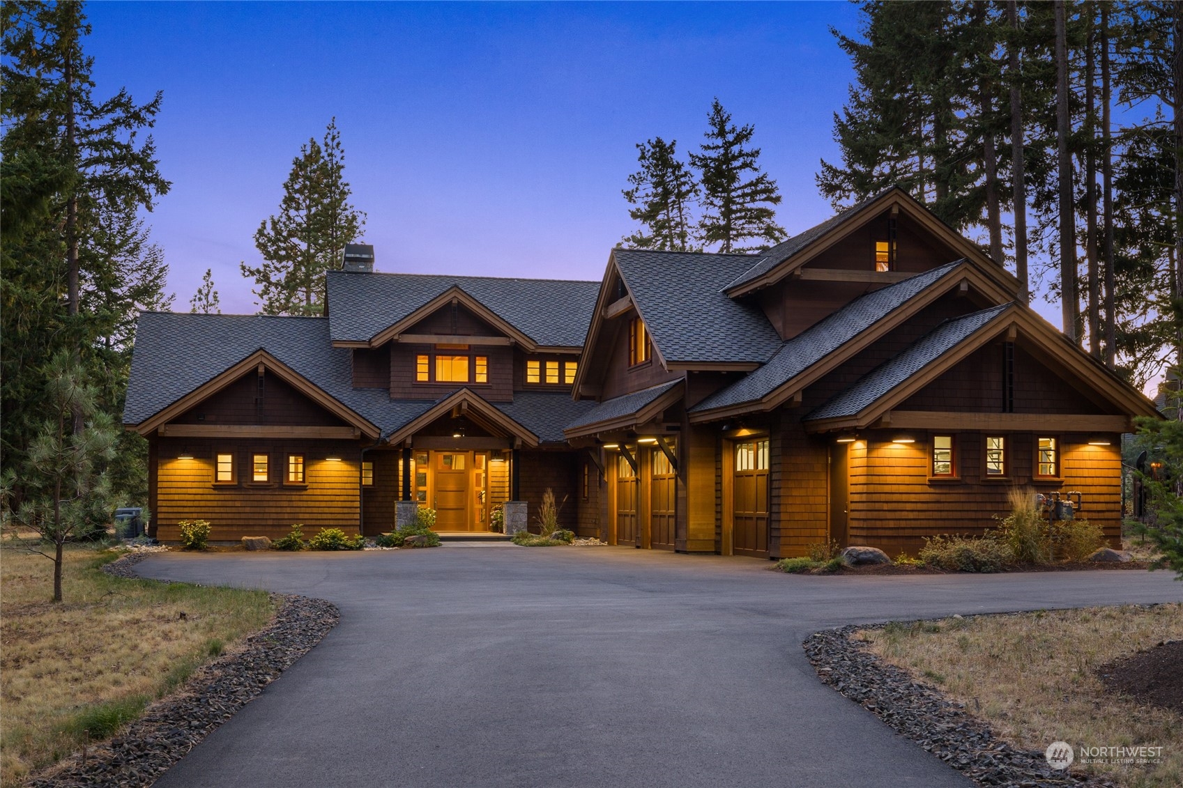 a view of a house and a yard