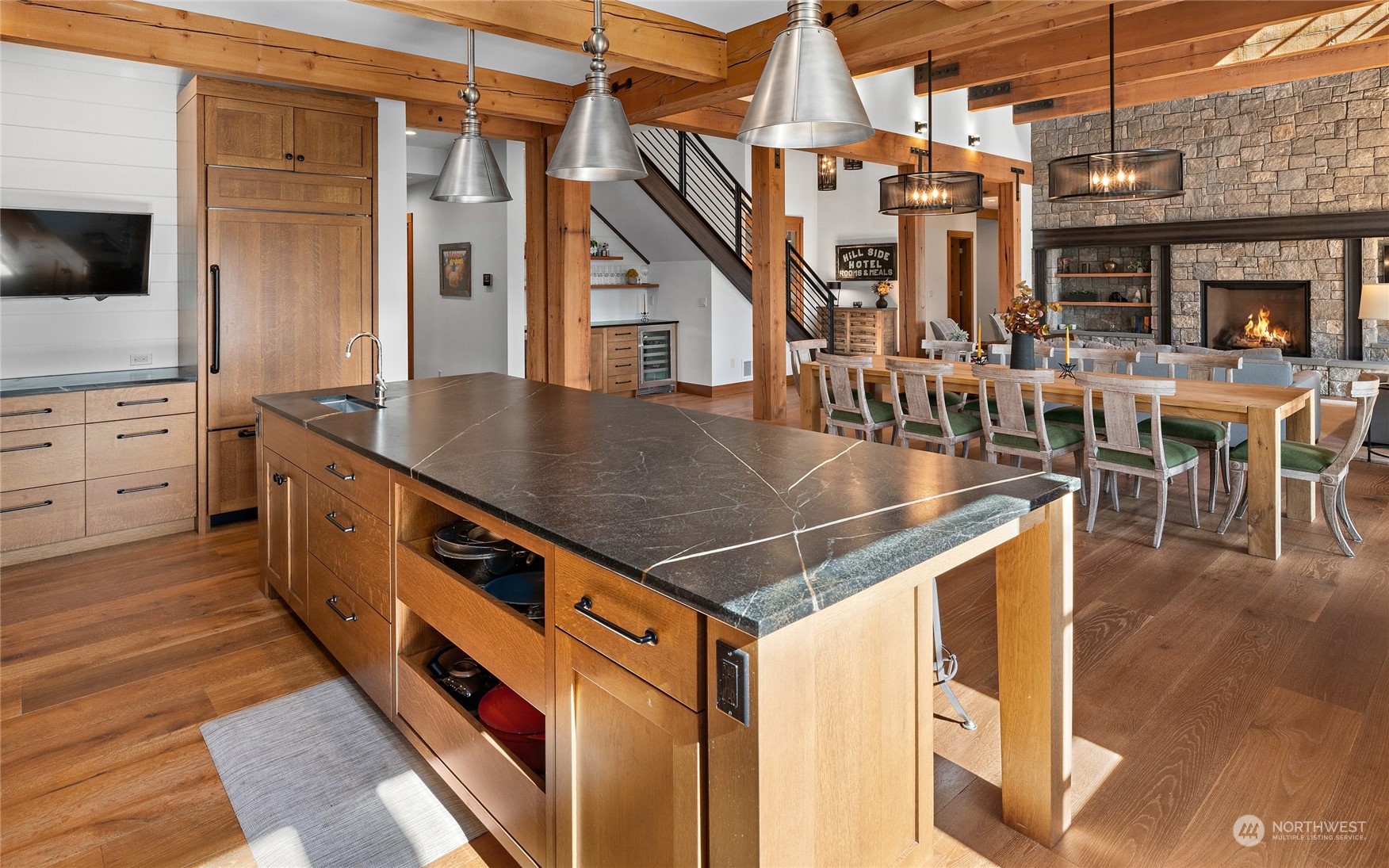 1040 Pinegrass Loop Cle Elum, WA 98922 - Photo 12 of 39 a kitchen with stainless steel appliances granite countertop a stove and a wooden floors