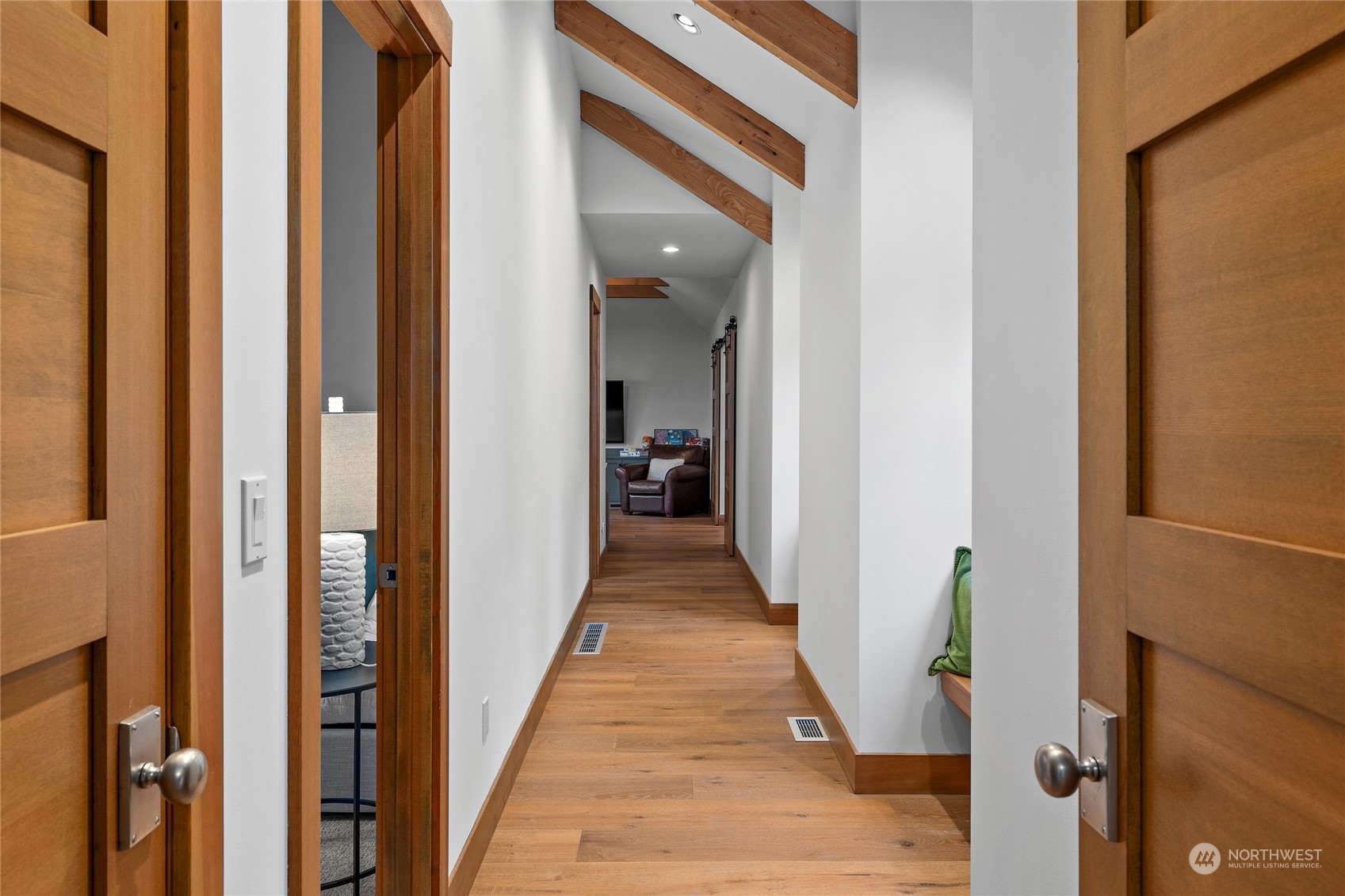 1040 Pinegrass Loop Cle Elum, WA 98922 - Photo 28 of 39 a view of a hallway with wooden floor and a bathroom