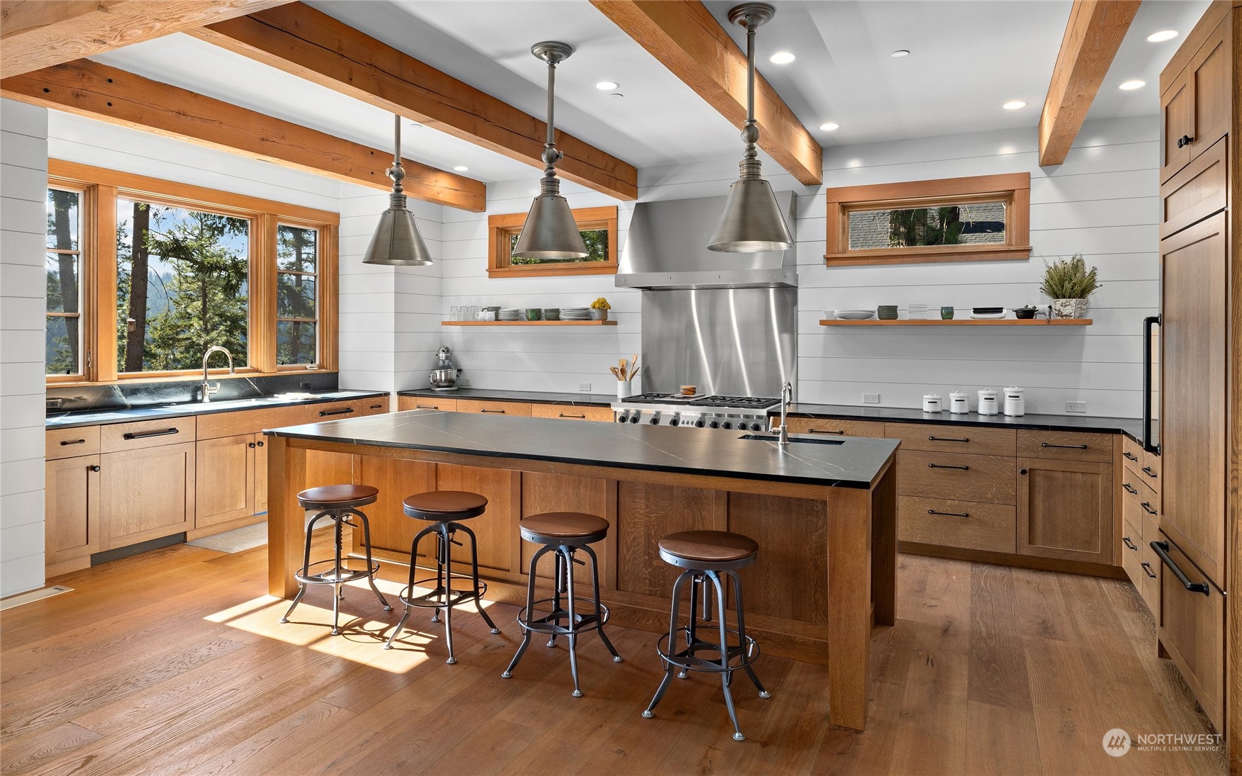 1040 Pinegrass Loop Cle Elum, WA 98922 - Photo 9 of 39 a kitchen with stainless steel appliances granite countertop a sink and wooden cabinets
