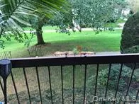 a view of a porch with a yard