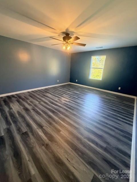 69 Harvest Ridge Drive Hickory, NC 28601 - Photo 10 of 17 a view of empty room with window and wooden floor