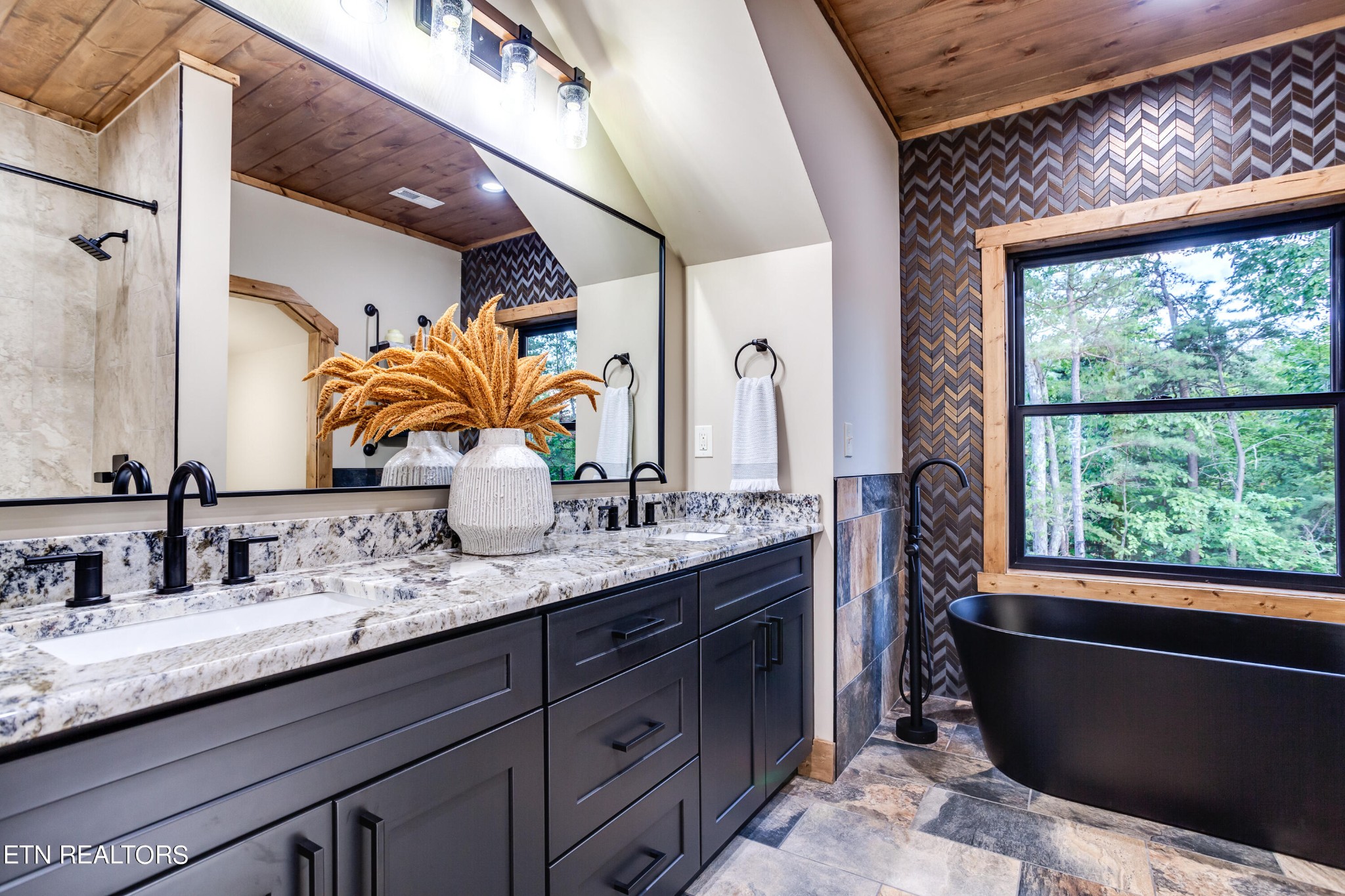 1820 High View Court Sevierville, TN 37876 - Photo 35 of 58 a bathroom with a double vanity sink and a large mirror