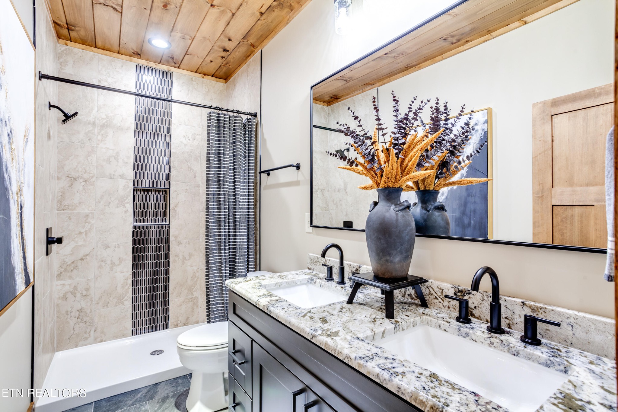 1820 High View Court Sevierville, TN 37876 - Photo 51 of 58 a bathroom with a granite countertop sink a toilet and shower