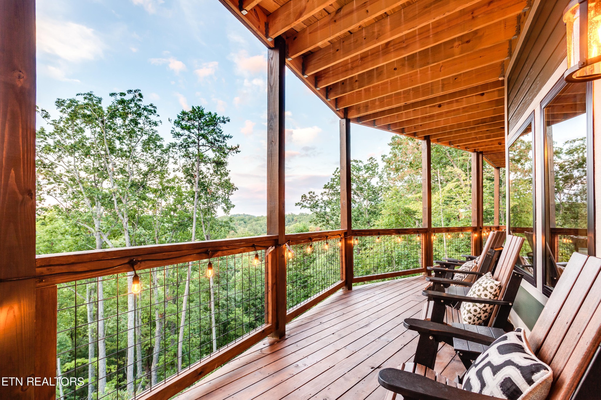 1820 High View Court Sevierville, TN 37876 - Photo 52 of 58 a view of a balcony with furniture and wooden floor