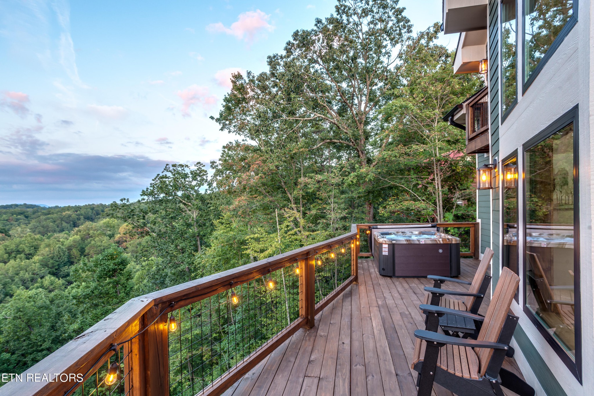 1820 High View Court Sevierville, TN 37876 - Photo 56 of 58 a balcony with wooden floor and outdoor seating